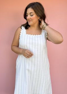 Get ready for summer with our Sea Worthy Linen Midi Dress! Effortlessly stylish with stripes and ric rac trim, this lightweight dress is perfect for vacations and beach days. Sun, sand, and style all in one piece! True to size Piper is wearing large Color: White with black pin stripes Stripe print square neck sleeveless midi dress featuring ric rac trim. Pocket at sides. Lined. Woven. Non-sheer. Lightweight. Fabric: 55%COTTON 35%LINEN 10%POLYESTER Fabric has no stretch Pull on design Cotton Linen Dresses Summer, Striped Summer Mini Dress For Day Out, Striped Mini Dress For Beach In Summer, Striped Mini Dress For Summer Beach, Casual Beach Dress With Striped Hem, Striped Lined Beach Dresses, Striped Summer Mini Dress For Beach Season, Summer Striped Lined Mini Dress, Striped Lined Mini Dress For Summer