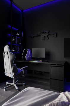 a white chair sitting in front of a computer desk