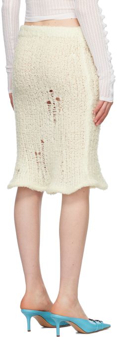 Open knit lightweight brushed wool-blend skirt. · Elasticized waistband · Padding at flared hem Supplier color: Off-white Yarn Skirt, Speckled Yarn, Flared Midi Skirt, White Flares, Midi Flare Skirt, Mid Length Skirts, Wool Skirts, Gray Skirt, Open Knit