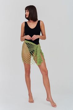 Mercedes Salazar X pītusa exclusive Handcrafted with exquisite detail, the Beaded Crochet Sarong features a soft open crochet knit accentuated by delicate beading throughout. Throw it on over a swimsuit and you’re sure to make a statement. Free Crochet Sarong Pattern, Crochet Sarong Pattern Free, Luxury Beachwear Sarong For Beach Cover-up, Green Summer Sarong, Crochet Sarong, Knit Sarong, Pink Lemon, Beaded Crochet, Mini Sundress