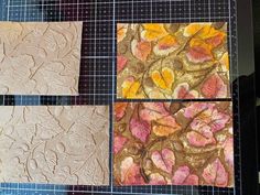 four different types of paper are being made on a cutting board and laid out to be used as wall hangings