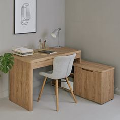 a wooden desk with two drawers and a chair