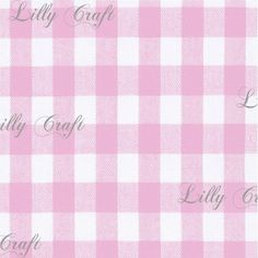 a pink and white checkered fabric with the word lilly craft on it in cursive writing