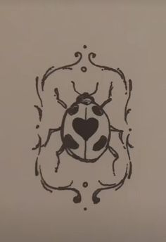 a black and white drawing of a lady bug