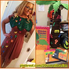 a woman in a dress standing next to some books and a palm tree with letters on it