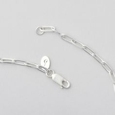 the bravura chain is a classic jewelry staple, crafted from sturdy sterling silver. the handsome rectangle links feature diamond cut edges designed to catch the light. Looking to start the perfect stack? Let this be the lead role or pair it with that chunky pendant that needs a trusty companion, Bravo! Silver Sterling Paperclip Bracelet With Adjustable Chain, Sterling Silver Paperclip Bracelet With Solid Link, Minimalist Sterling Silver Box Chain Bracelet, Sterling Silver Paperclip Bracelet With Solid Link Construction, Sterling Silver Chain Bracelet For Everyday, White Gold Cable Chain Bracelet With Rectangular Links, Sterling Silver Necklaces With Rectangular Links, Silver Chain Bracelet With Adjustable Rectangular Links, Sterling Silver Necklace With Rectangular Links