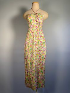 "1980s Floral mid=calf straight cut dress with large pleat in the back, a tight strapless bodice with a wide collar and halter tie in the front. Bust measures 32\", waist 29\", hips 38\", length measures around 40 1/2\" including adding the shoulders. Size small" Fitted Sleeveless Halter Dress For Spring, Fitted Bodice Sleeveless Halter Dress For Spring, Spring Strapless Dress With Ruched Bodice For Date Night, Spring Halter Dress With Fitted Bodice For Party, Spring Party Halter Dress With Fitted Bodice, Retro Spaghetti Strap Party Dress, Fitted Strapless Halter Dress For Beach, Fitted Sleeveless Halter Dress With Gathered Neckline, Spring Party Halter Dress With Gathered Neckline