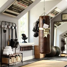 there is a boxing bag hanging from the ceiling