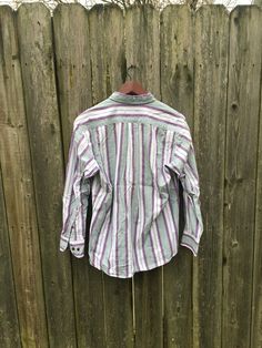 This is a great button up that isn't flashy or crazy, just simple and cool. It will look great with anything and is ready to go. It is in great condition and has no rips, holes, stains or smells. Measurements: Pit to pit: 22 1/4 inches Collar to bottom front: 23 3/4 inches Collar to bottom back: 26 inches Sleeve Length (from collar): 27 3/4 inches Size on tag: Medium Biker Shirts, Vintage Vans, Small Photos, Button Dress, Button Up Shirt, Columbus, Looks Great, Button Up Shirts, Button Up