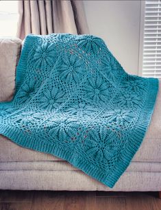 Designed by Holland Designs Crochet. Worked in squares to create a unique afghan to compliment any home. Kit includes Mary Maxim Mellowspun DK yarn and pattern. Requires crochet hook H-8. Size 46 x 56". Intermediate Crochet. Motifs Afghans, Beau Crochet, Light Worsted Weight Yarn, Confection Au Crochet, Crochet Blanket Designs, Haken Baby, Afghan Patterns, Crochet Afghans, Afghan Pattern