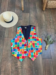 Size Large/XLarge Made in USA   100% Cotton Saddle River Measurements: Chest- 44 inches Length- 25 inches B19 4.1 012624 Vintage Jesse Spano Vest, 90s Bright Fruit Vest, Vintage Colorful Vest, Summer Vest,90s Checkered Fruit Vest,Classic 90s Vest, Fun Fish Vest Vintage Vest Outfit, 90s Vest, Colorful Vest, Wardrobe Makeover, Summer Vest, Outfit 90s, Vintage Vest, Vest Outfits, Color Blocking