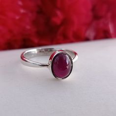 Handmade ruby bohemian ring , you can wear this ring as a party wear ring .. Title - ruby silver ring Stone color - ruby Stone shape - oval Material - Sterling silver 925 Note - We use natural gemstones, so color shade may be little bit different .. we are giving you best quality rings on best price .. contact us for more quantity Dainty Rings With Natural Stones For Gift, Dainty Rings With Natural Stones As Gifts, Dainty Promise Ring With Natural Stones, Dainty Natural Stone Promise Rings, Toe Ring With Natural Stones For Gift, Stackable Rings With Natural Stones As A Gift, Natural Stones Stackable Rings As Gift, Bohemian Cabochon Rings As A Gift, Bohemian Cabochon Ring For Gift