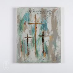 an abstract painting with three crosses on it