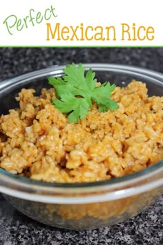 mexican rice with cilantro and parsley in a glass bowl on a granite countertop