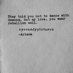 an old piece of paper with the words, they told you not to dance with demons, but my love, you wear rebellion