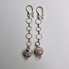 White And Tan Ball Drop Earrings On Mixed Metal. Art Deco. Pierced Ear Gold Wire Wrapped. Hand Crafted In The Usa. Gift Wrapped. Questions Welcome, Pet, Friendly, Smoke-Free. Ball Drop Earrings, Pierced Ear, Mixed Metal Earrings, Mixed Metal Jewelry, Ball Drop, Gold Wire, Metal Earrings, Mixed Metals, Ear Piercings