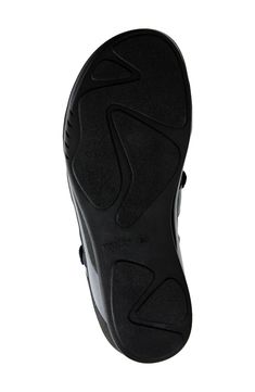 This sturdy yet flexible sandal offers convenient all-day comfort, while the adjustable hook-and-loop straps ensure a perfect fit. Flat sole Cushioned footbed with arch support Leather upper and lining/synthetic sole Imported Leather Slip-on Slip-resistant Sandals, Leather Slip-on Sandals With Slip-resistant Sole, Slip-on Leather Sandals With Slip-resistant Sole, Black Sport Sandals With Arch Support For Walking, Leather Sandals With Slip-resistant Round Toe, Ergonomic Black Slip-resistant Sandals, Functional Open Toe Slip-resistant Sandals, Functional Open Toe Sandals With Ortholite Insole, Slip-resistant Open Toe Sandals