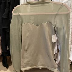 Super Fitting And Sexy Free People Top. Beautiful Sage Green Color. Fits More Like A Small/Medium. Smoke Free Home. Bell Sleeve Bodysuit, Renee Simonsen, Brown Bodysuit, Knitted Crop Tank Top, Green Long Sleeve Top, Long Sleeve Layer, Tie Dye Tank Top, Black Camis, Waffle Knit Top