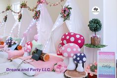 there are many mushroom decorations on display in this party decoration shopfront window, with fairy lights strung from the ceiling