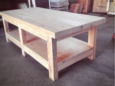 a table made out of wood in a garage