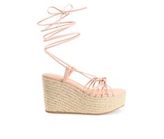 With the Catalinn by Journee Collection, you can bring on the summer vibes. The multi-straps on this tie-up shoe are guaranteed to brighten up your day. Soft vegan leather uppers, a 4 mm Tru Comfort Foam™ footbed, and an espadrille-wrapped platform heel add texture to the design. Luxe Vegan Leather upper, Dainty ankle wrap tie-up design, Approx. 4\ espadrille wrapped platform / wedge, Open Soft Square toe, Tru Comfort Foam™ footbed, Man-made outsole, Caged multi-strap design with knotted detail Spring Strappy Wedge Sandals With Wrapped Heel, Summer Wedge Heel Heels With Strap, Spring Adjustable Heel Strap Lace-up Sandals, Trendy Lace-up Sandals With Heel Strap For Beach, Summer Lace-up Sandals With Strap And Round Toe, Trendy Adjustable Lace-up Sandals With Heel Strap, Adjustable Strappy Heels For Vacation, Spring Lace-up Sandals With Heel Strap And Adjustable Fit, Summer Lace-up Strappy Sandals