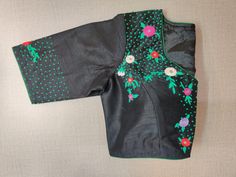 Beautiful black designer saree blouse with colorful embroidery. Buy designer blouse in USA from Pure Elegance. Disclaimer: The actual product may vary slightly from the image. These are custom orders, hence expect slight variation in color, placement of the motif or buta. ESTIMATED DELIVERYBecause this is a custom order, it would take about 2 weeks from the date of purchase. RETURN POLICY: This product is a custom order and cannot be returned or exchanged. Unstitched Floral Embroidery Blouse For Navratri, Black Blouse With Resham Embroidery For Festivals, Black Tops With Resham Embroidery For Festivals, Black Embroidered Blouse Piece For Festive Occasions, Festive Black Embroidered Blouse Piece, Festive Embroidered Black Blouse Piece, Traditional Black Choli With Motifs, Black Blouse With Resham Embroidery For Festive Occasions, Festive Black Blouse With Resham Embroidery