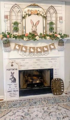 a fireplace decorated for easter with bunnies and greenery on the mantel above it