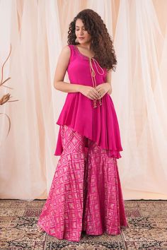 Hot pink crepe peplum top with cutdana hand embroidery. Comes with banarasi brocade sharara. - Aza Fashions Peplum Top Outfits Indian, Brocade Sharara, Top And Sharara Set, Suit Stitching, Peplum Top Outfits, Banarasi Brocade, Baby Pink Colour, Sharara Set, Pink Parties