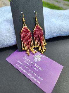 Burgundy & gold, brick stitch fringe earrings. Finished with gold medal earring hooks. Adjustable Gold Jewelry With Beaded Fringe, Gold Beaded Fringe Tassel Dangle Earrings, Gold Beaded Fringe Dangle Tassel Earrings, Gold Beaded Fringe Tassel Earrings, Gold Beaded Fringe Earrings With Adjustable Fit, Adjustable Gold Tassel Earrings With Fringe, Gold Beaded Dangle Earrings With Tassels, Gold Tassel Earrings With Gold Beads For Gifts, Adjustable Handmade Gold Tassel Earrings