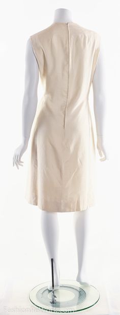 "▲The Details▲ -Vintage 60's Cream White Silk Originala Dress -Sleeveless Shift dress -Hidden inset seams along darts -Princess Seams -Polyester satin lining -this dress if a piece of vintage history A little bit of history on Originala Originala was one of the better suit and coat houses located on Seventh Avenue in New York. It was started in 1941 by the Bader Brothers. Through the years, several well known designers worked at Originala: Marc Bohen (who went on to design at Dior) was there in Beige Knee-length Lined Dress, Beige Silk A-line Midi Dress, Formal Cream Fitted Silk Dress, Vintage Silk Midi Cocktail Dress, Vintage Silk Midi Dress For Cocktail, Fitted Linen Dress With Lining, Classic Knee-length Silk Dress, Fitted Beige Silk Midi Dress, Classic Knee-length Dress For Vintage Fashion