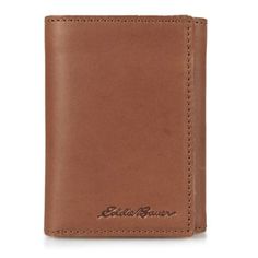 The perfect wallet for the outdoorsman. This genuine leather trifold wallet from Eddie Bauer has six card slots, a bill pocket with divider, and is made to withstand the elements. So whether you're out hiking or just running errands, this wallet will keep your essentials safe and secure. Genuine Leather 6 Card Slots Bill Pocket with Divider Brown Trifold Wallet For Everyday Carry, Leather Trifold Wallet, Tractor Supply, Trifold Wallet, Eddie Bauer, Running Errands, Tractor, Card Slots, Slots