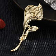 Brooches -Mini Suit Cubic Zirconia Brooch Multifunctional Creative Tulip Brooch Clothing Accessories Style: Cute/Romantic Shape\pattern: Flower Metals Type: copper Material: Cubic Zirconia Item Type: Brooches Gender: Women Brooches Type: Brooches Model Number:1005004974335111 Gold Flower Brooch Lapel Pin, Gold Flower Brooch For Party, Gold Flower Brooches For Party, Elegant Gold Flower Lapel Pin, Elegant Rose Gold Flower Brooches, Elegant Rose Gold Lapel Pin Brooch, Rose Gold Brooch Pins For Gifts, Elegant Gold Flower Brooch, Elegant Gold Flower Brooches