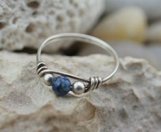 Blue Sterling Silver Stackable Jewelry, Unique Blue Jewelry With Silver Beads, Blue Sterling Silver Jewelry With Round Beads, Sterling Silver Hypoallergenic Blue Rings, Blue Stackable Jewelry As Gift, Unique Blue Stackable Jewelry, Blue Sterling Silver Wire Wrapped Jewelry, Unique Blue Hypoallergenic Jewelry, Nickel Free Blue Rings For Jewelry Making