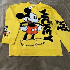 , New Sweater , Material Viscose,Polyester,Polyqmide; Size L Casual Yellow Sweater With Graphic Print, Retro Yellow Sweatshirt For Winter, Trendy Long Sleeve Mickey Mouse Top, Yellow Long Sleeve Top With Character Print, Trendy Mickey Mouse Long Sleeve Top, Yellow Casual Sweatshirt With Cartoon Print, Casual Crew Neck Mickey Mouse Sweatshirt, Micky Mouse Sweater, Yellow Graphic Print Crew Neck Sweater