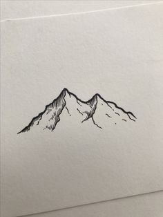 a black and white drawing of two mountains