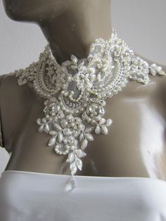 Lace Bridal Necklace Ivory Lace Statement Necklace pearl and crystal stone lace necklace Please get in touch for more information. Thank you so much for choosing my store. It is very importent to let my customers happy, so dont hesitate to contact me for your questions. Standart shipping I ship from Turkey , General delivery durations are USA : 12 /20 days Canada : 10/20days Australia: 15/25 days Pearl White Rhinestone Necklace For Wedding, White Crystal Rhinestone Necklace For Wedding, Elegant Crystal Bib Necklaces For Weddings, White Lace Necklace For Wedding, Wedding Pearl Necklace With Rhinestones, Elegant White Rhinestone Necklace For Wedding, White Rhinestone Choker For Wedding, White Bridal Pearl Choker Necklace, White Rhinestone Necklace For Wedding