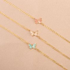 Our 14K Gold Butterfly Bracelet is a dainty and enchanting piece, perfect for adding a touch of whimsy and color to your jewelry collection. Each bracelet features intricately crafted butterfly charms, detailed with vibrant enamel in shades of blue, pink, or white. These charms, measuring 9mm x 6mm, are set against the backdrop of lustrous 14K gold, available in your choice of Gold, Rose Gold, or White Gold. The adjustable length of 6.5" to 7.75" ensures that the bracelet can comfortably fit a v Rose Gold Adjustable Jewelry With Butterfly Charm, Adjustable Rose Gold Jewelry With Butterfly Charm, Friendship Butterfly Charm Jewelry, Adjustable Jewelry With Butterfly Charm For Friendship, Adjustable Butterfly Charm Jewelry For Friendship, White Butterfly Charm Bracelet For Gift, Personalized Dainty Enamel Jewelry, Delicate Adjustable Jewelry With Butterfly Charm, Adjustable Delicate Jewelry With Butterfly Charm