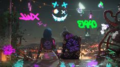 two people sitting on the ground in front of neon lights and graffiti written all over them