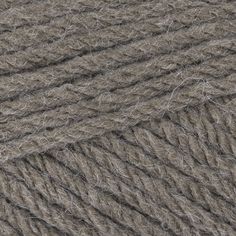 the yarn is light brown and has been dyed with grey wool, which is very soft