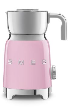 a pink toaster with the word smeg on it's front and side