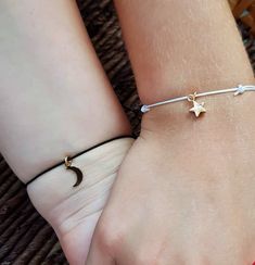 Star bracelet, string bracelet, gold plated star, charm bracelet, friendship, star charm, bff gift, make a wish, bridesmaids gift, couples Beautiful minimalist gold plated star and string bracelet. Mix and match with other bracelets available in our store, for an effortlessly chic look! Stars symbolize wishes, mystery, imagination, and adventure. Also a perfect gift for your bff, your bridesmaids, or a special person in your life. 8 mm gold plated star hangs loosely from imitate silk polyester s Mommy And Me Bracelets, Star Charm Bracelet, Toddler Bracelet, Bracelet String, Mother Daughter Bracelets, Bff Gift, Mother Daughter Gifts, Bracelet Friendship, Red Gift