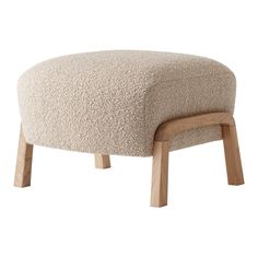 the foot stool is made out of wood and sheep wool