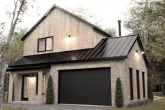 a two story house with a metal roof