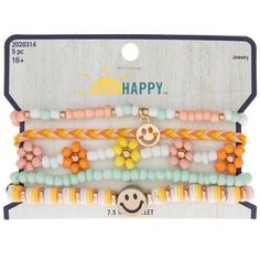 Bring a cheerful air to your style with accessories like Peach & Mint Smile Bracelets. This set features elastic bracelets with mint, white, peach, and metallic flower and smiley face beads. Wear them together or separately for an uplifting addition to your daily look! Details: 	 Thickness: 1/8" - 1/2" 	 Size: One Size Fits Most 	 Metal Color: Gold Card contains 5 bracelets. Playful Beaded Bracelets For Friendship In Spring, Trendy Spring Friendship Bracelets With Letter Beads, Bracelet Combos, Style With Accessories, Smiley Face Beads, Bracelet Business, Beachy Bracelets, Clay Bracelets, Gifts 2022