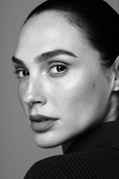 a black and white photo of a woman's face