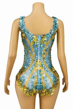 Elevate your style with our latest bodysuit featuring dazzling rhinestone accents inspired by Taylor Swift's iconic fashion sense. Crafted from luxurious, body-hugging fabric, this piece not only enhances your allure but also offers unparalleled comfort. Perfect for glamorous nights out, chic cocktail parties, or even a stylish concert appearance, this bodysuit is designed to make you shine. Embrace the spotlight and let the shimmering details and exceptional fit highlight your unique charm. Han Fitted Sequins Bodysuit Glamorous Style, Glamorous Fitted Bodysuit With Sequins, Fitted Sequin Bodysuit For Glamorous Look, Glamorous Fitted Sequin Bodysuit, Summer Embellished Fitted Corset, Embellished Fitted Summer Corset, Embellished Fitted Corset For Summer, Fitted Sleeveless Bodysuit For Party Season, Glamorous Fitted Embellished Bodysuit