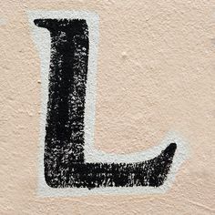 the letter l is painted black and white