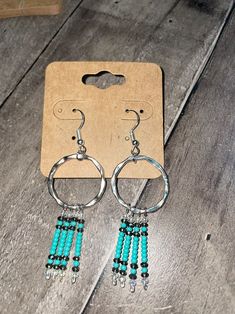 Dangle - Etsy Turquoise Beaded Dangle Hoop Earrings, Southwestern Beaded Fringe Dangle Jewelry, Southwestern Style Dangle Jewelry With Beaded Fringe, Bohemian Beaded Hoop Earrings In Sterling Silver, Southwestern Style Beaded Fringe Dangle Jewelry, Silver Beaded Dangle Hoop Earrings, Silver Beaded Fringe Dangle Jewelry, Turquoise Silver Beaded Dangle Earrings, Bohemian Round Beaded Earrings With Silver Beads