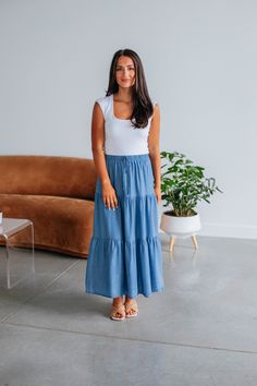 Details: Beth Midi Skirt Elastic Smocked Waistband Denim Look Soft Lightweight Material Tiered Look No Stretch (Besides Waistband) Midi Length Flowy Fit Available in Steel Blue Length: 35" Material: 100% Tencel We are recommending: Small - Sizes (25-26) Medium - Sizes (27-28) Large - Sizes (29-30) Casual Tiered Denim Skirt, Casual Stretch Tiered Skirt, Casual Tiered Denim Skirt For Day Out, Boat Neck Midi Dress, Athleisure Dress, Scarf Shirt, Style Finder, Curvy Jeans, Curvy Dress