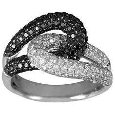 Love Knot Ring-jewelry-Cherie Dori-Sorrel Sky Gallery Diamond White Ring With Black Diamonds, Black Diamond Platinum Ring For Anniversary, Diamond White Rings With Black Diamonds, Black Cubic Zirconia Diamond Ring With Pavé Setting, Black Cubic Zirconia Diamond Ring With Pave Setting, Black Cubic Zirconia Ring With Vvs Clarity, Round Cut Black Diamond Ring, Black Platinum Ring With Brilliant Cut, Black Platinum Rings With Brilliant Cut